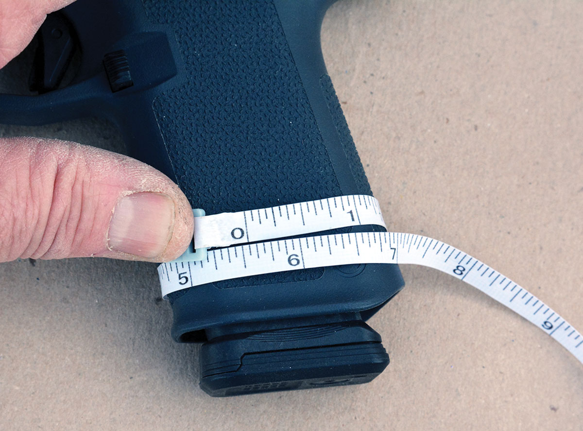The grip features a flat back strap, is notably smaller than the Glock 19 and is a much better fit for most shooters.